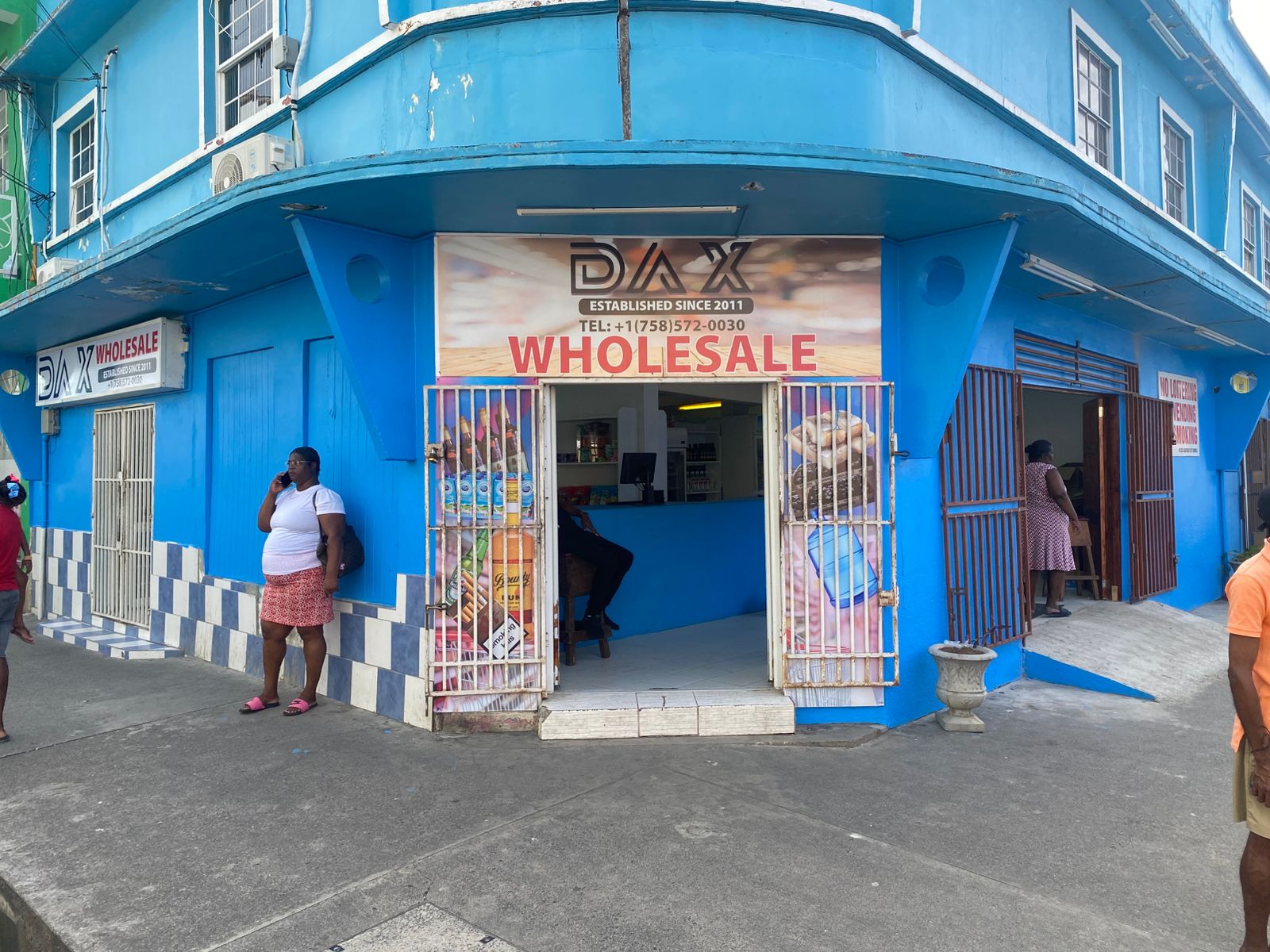 Blue wholesale store with branded storefront graphics